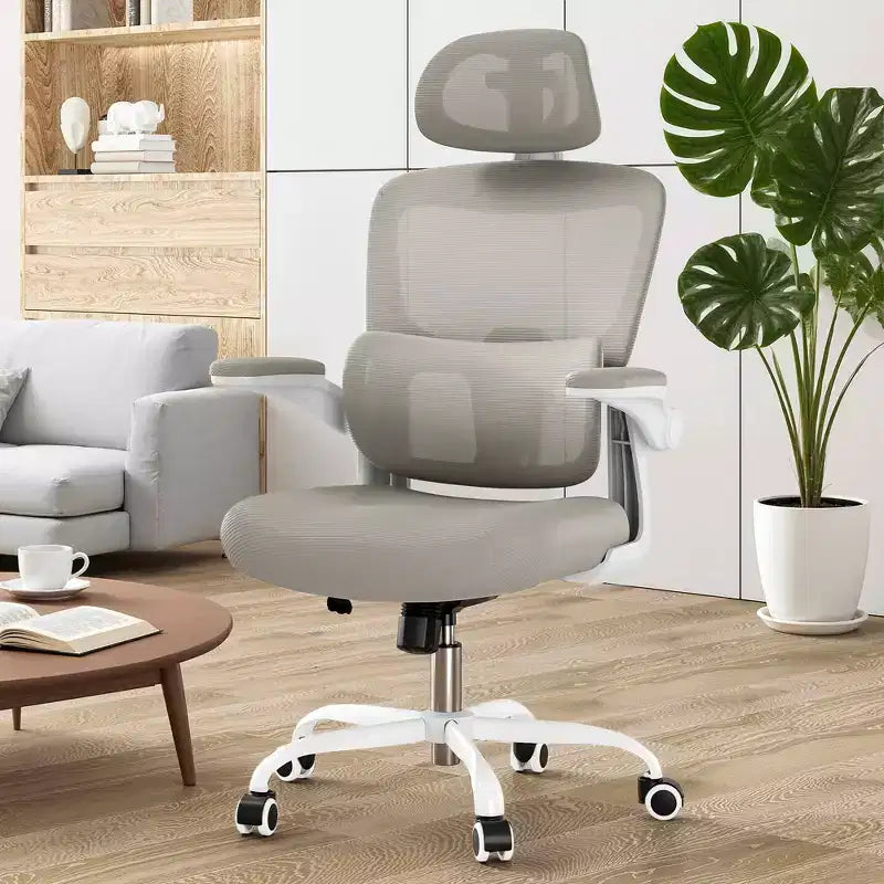 Sedia ergonomica da ufficio con schienale alto, braccioli ribaltabili e supporto lombare regolabile